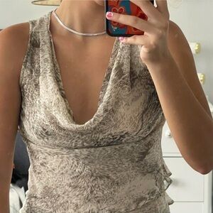 Cowl neck tank top with ruffled details in the back